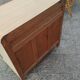 Vintage commode with tapered legs.