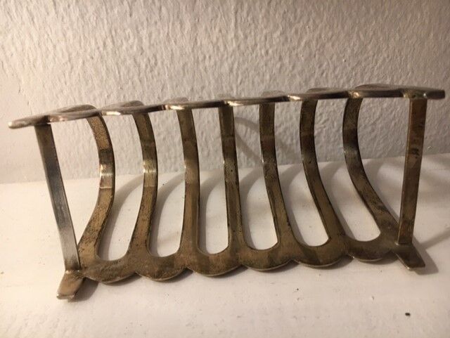 Old silver metal toast door