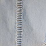 old linen sheet with monogram
