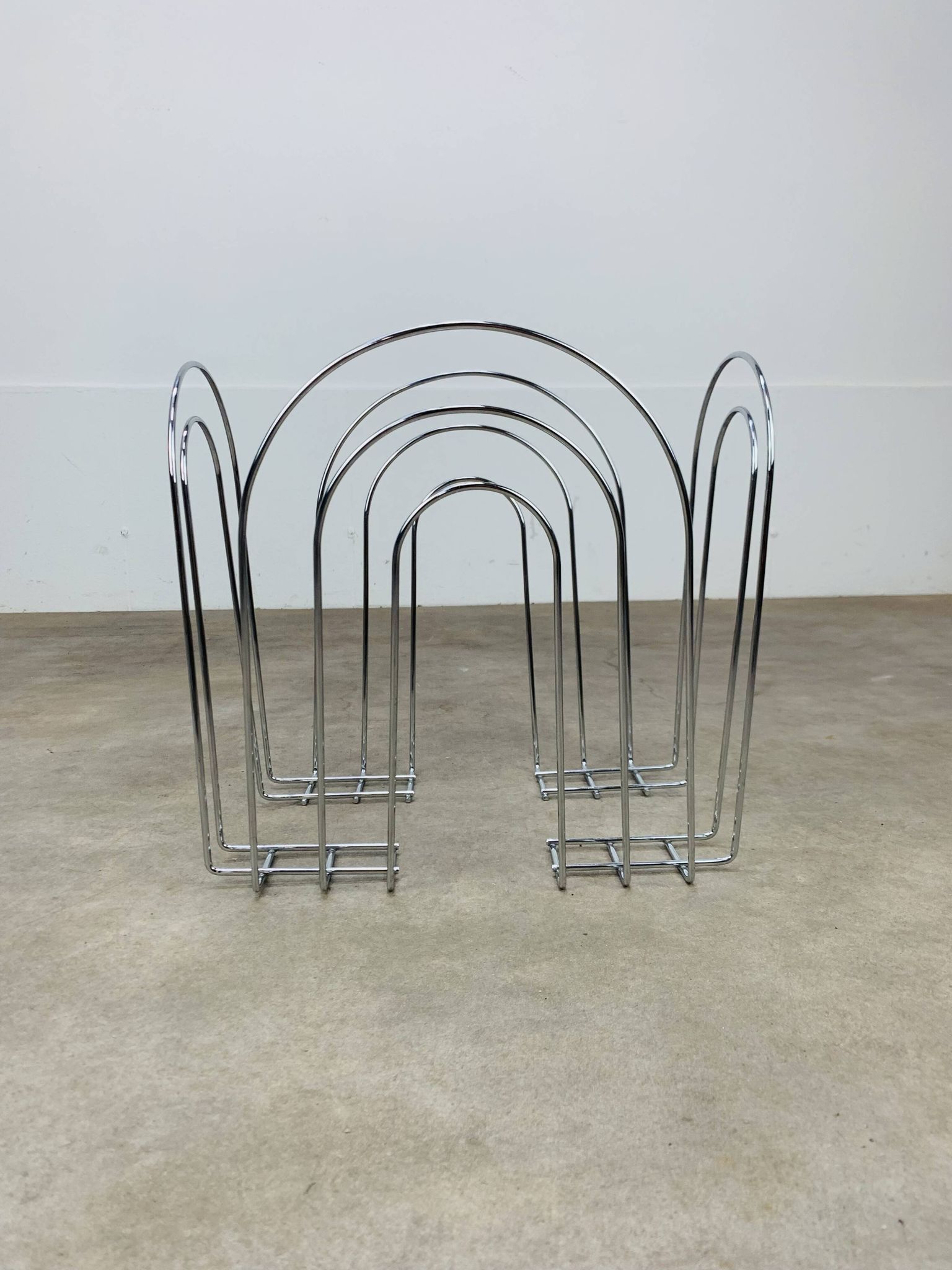 Postmodern chrome metal magazine rack from the 80s
