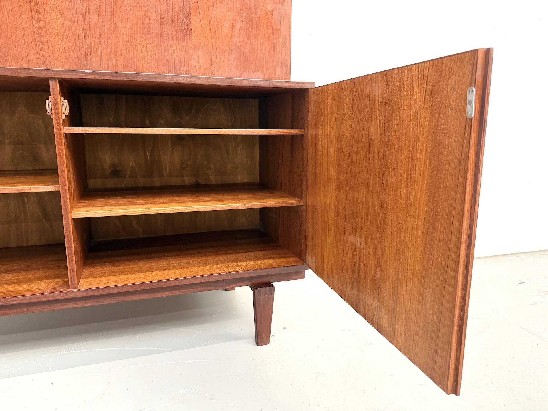 Teak and brass bookshelf designed by Peter Løvig Nielsen, CI.