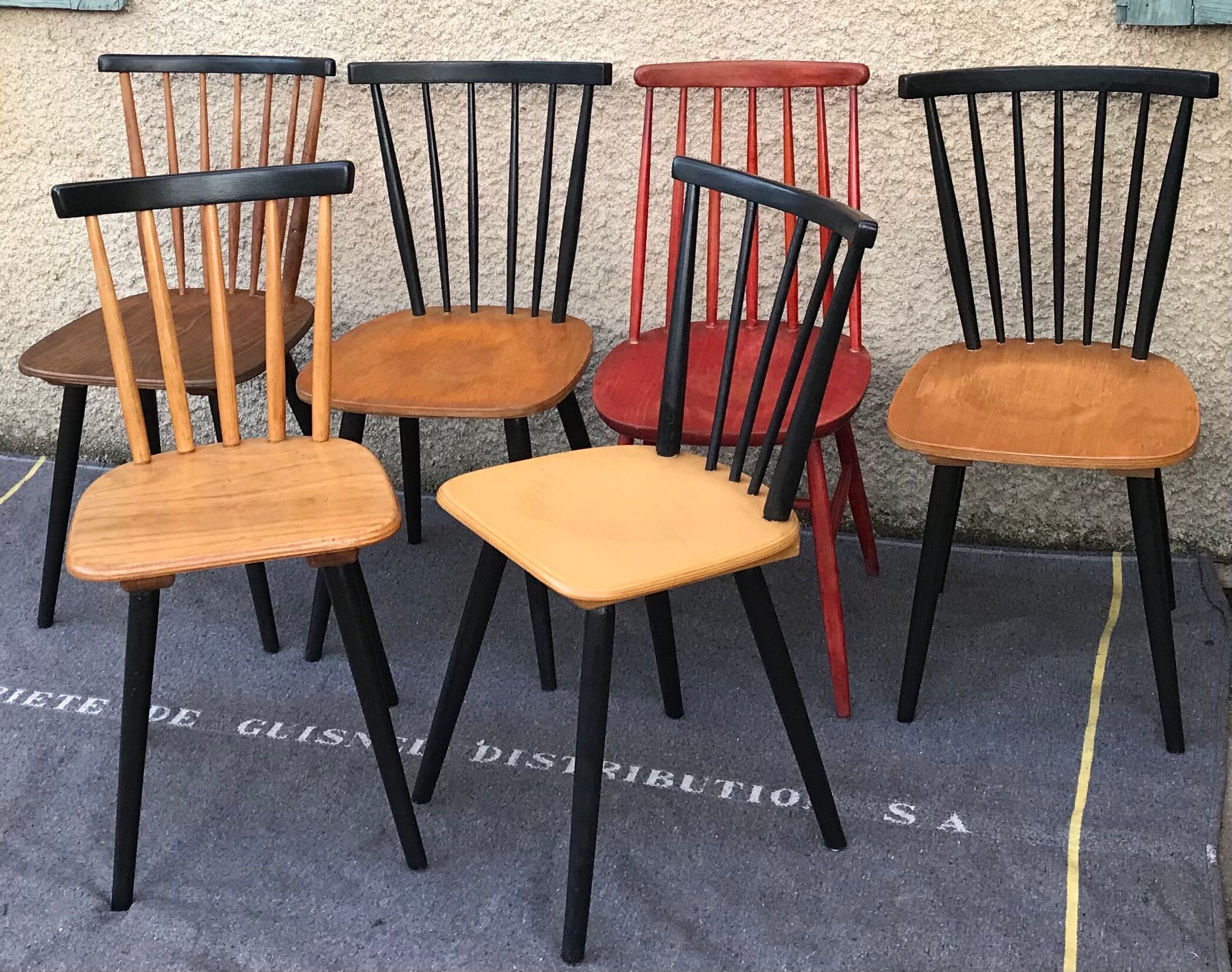 Set of 6 mismatched vintage chairs with bars and compass legs
