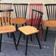 Set of 6 mismatched vintage chairs with bars and compass legs