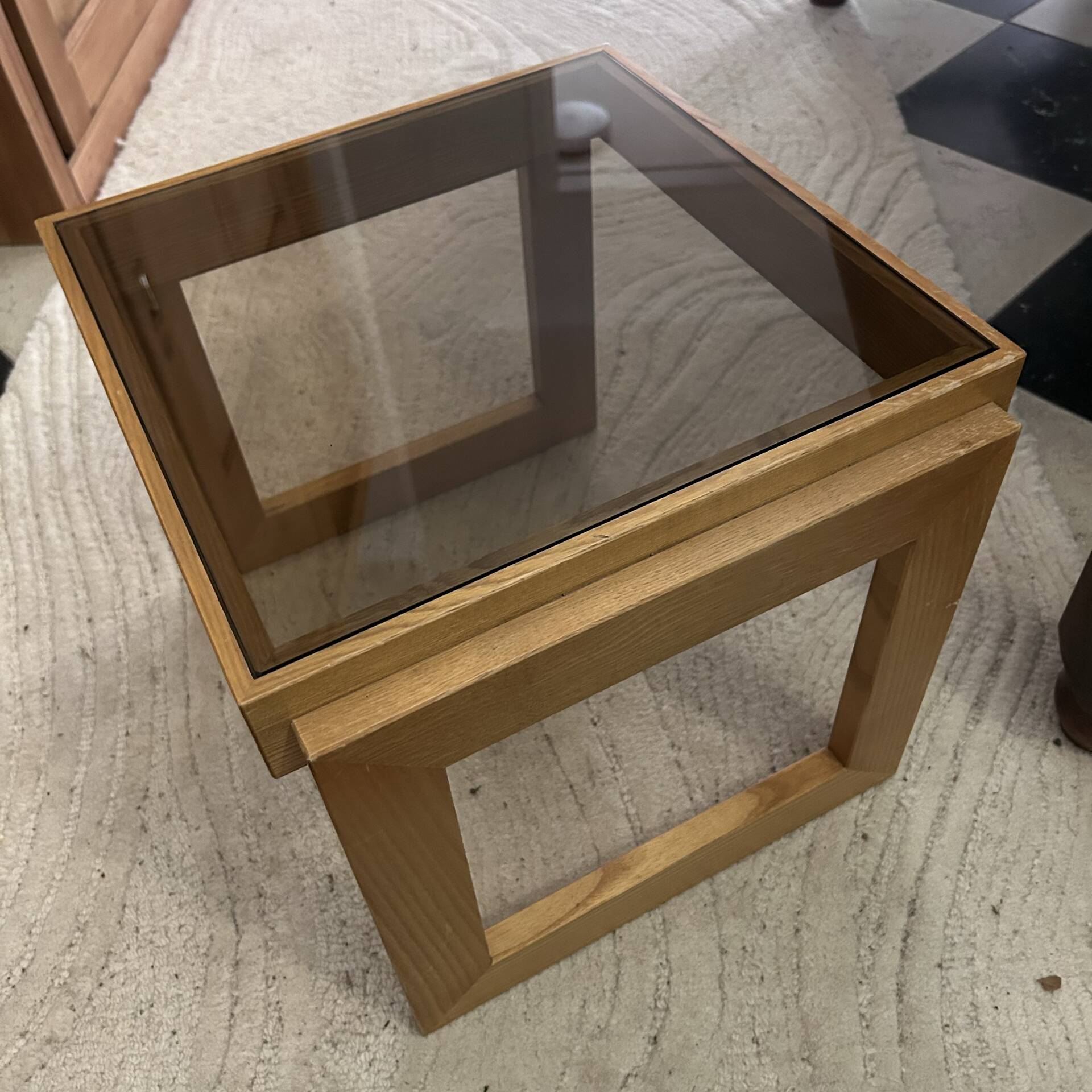 Modernist side table in wood and smoked glass