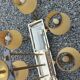 Vintage chandelier in gilded brass, chromed metal and plexiglass from the 1950s