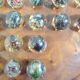 Vintage wooden solitaire game with resin balls and insects – Madaga