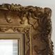 Carved and gilded wooden mirror early in the 20th century  - 96x76cm