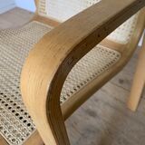Vintage armchair in caning