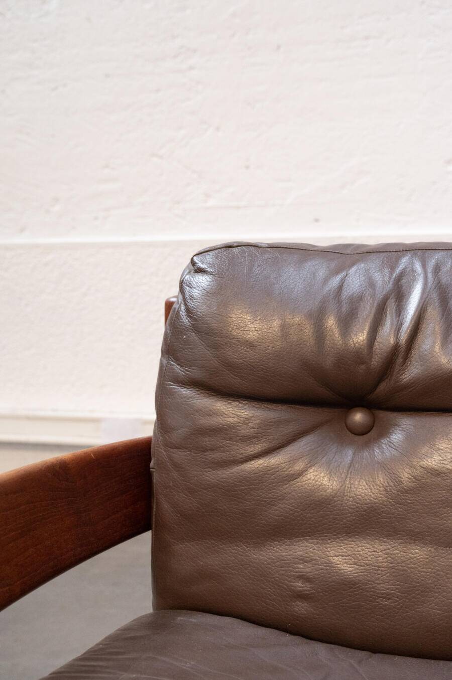 Teak and leather armchair