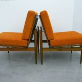vintage orange armchairs