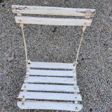 Wooden slatted garden chair with wooden slats and iron feet