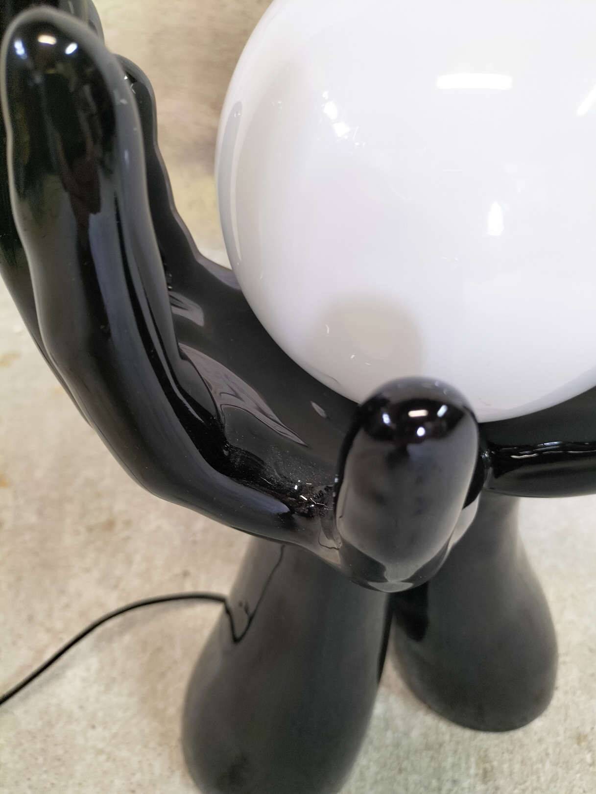 Black and white opaline hand lamp.