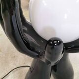 Black and white opaline hand lamp.