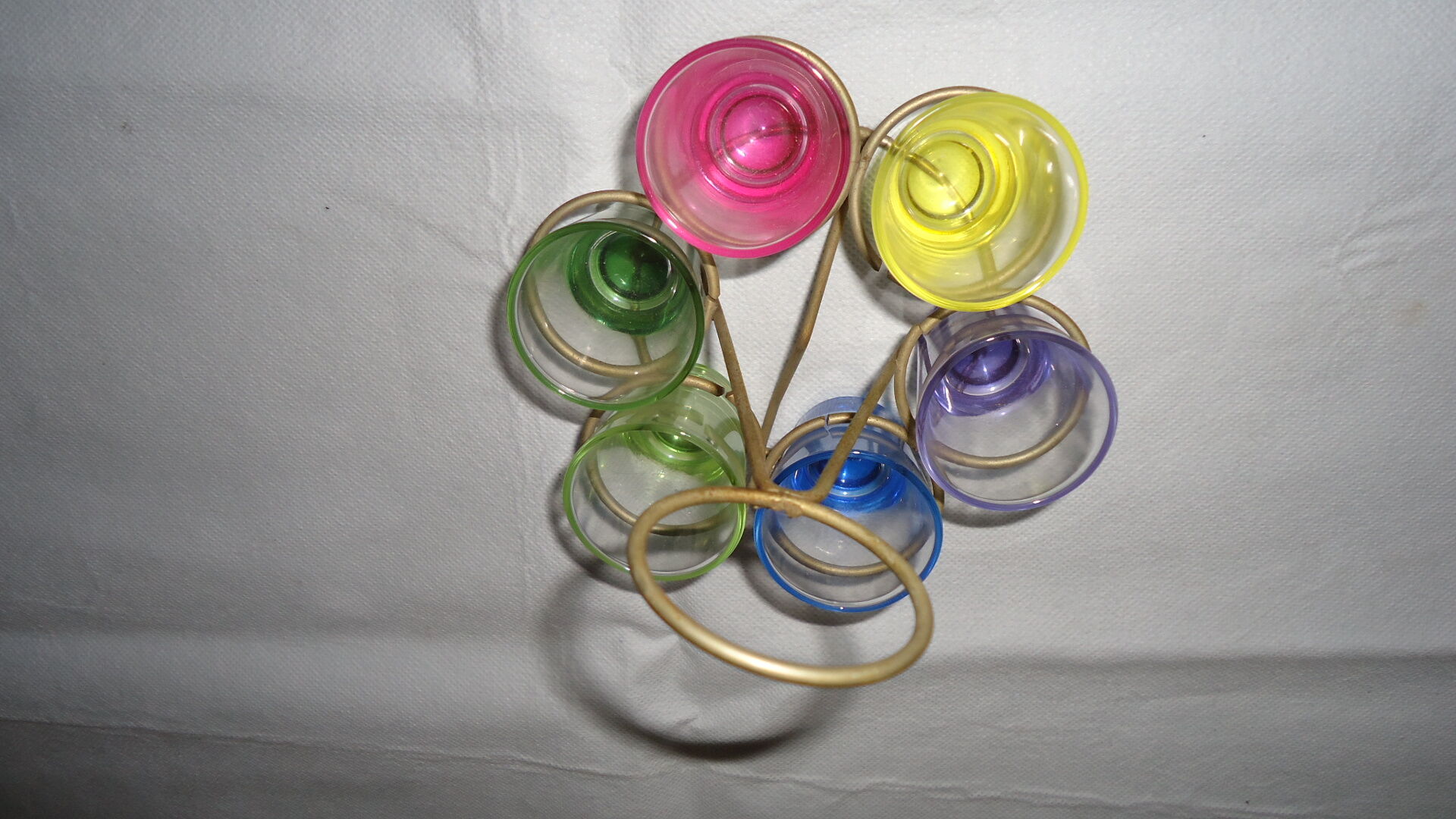 Liqueur glasses on vintage stand