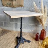 Bistro table in wood and cast iron