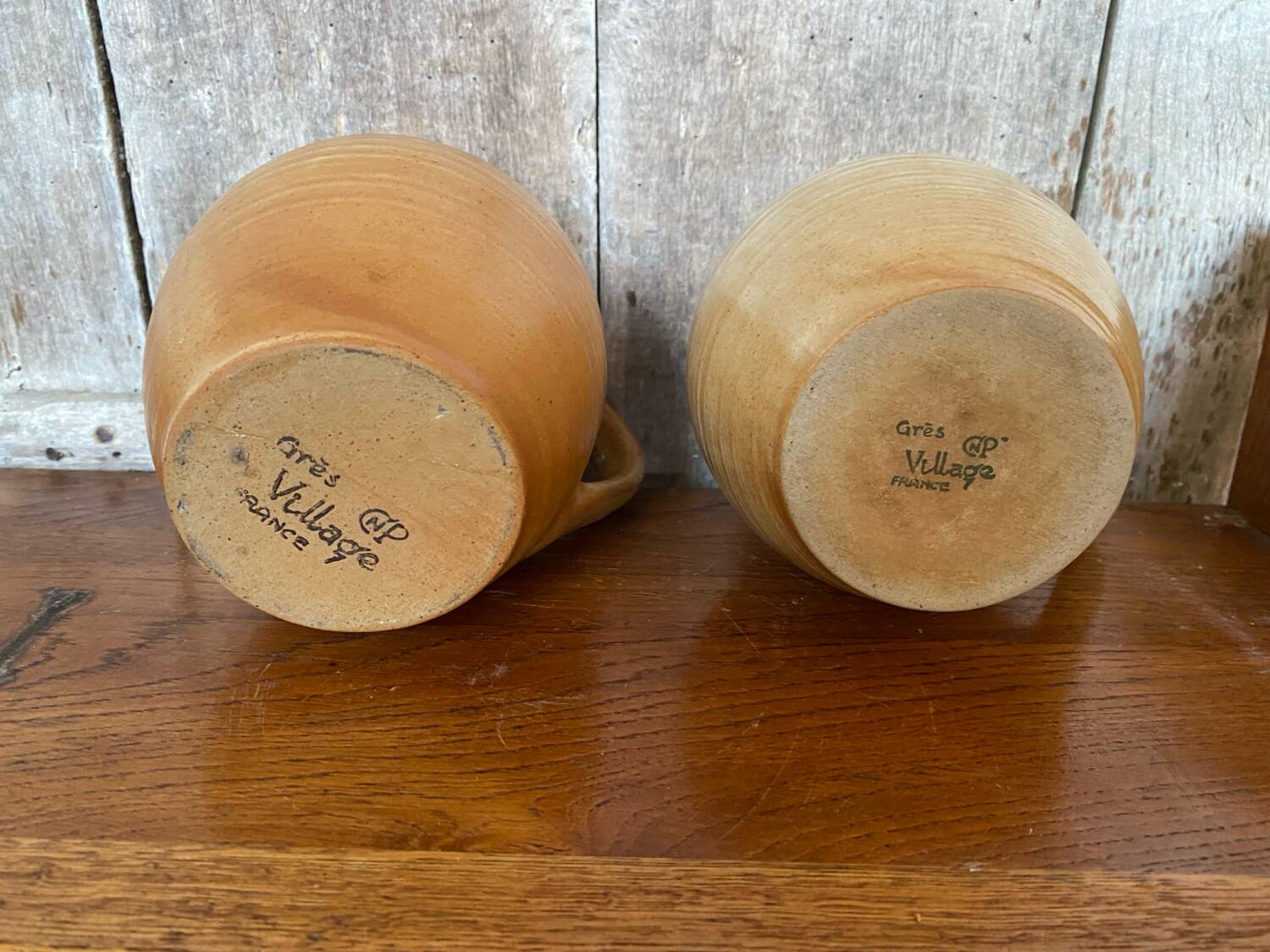 Pair antique cnp village beige & cream stoneware pitchers vintage