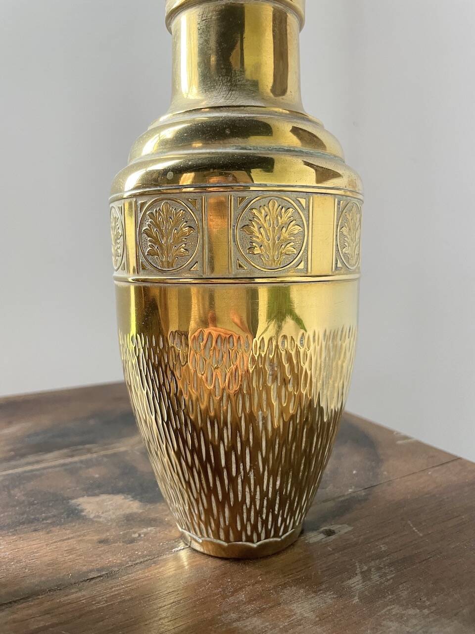 Duo of embossed brass vases