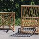 Rattan armchair and its footrest by Audoux & Minet 1950