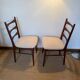 Pair of vintage wood and corduroy chairs