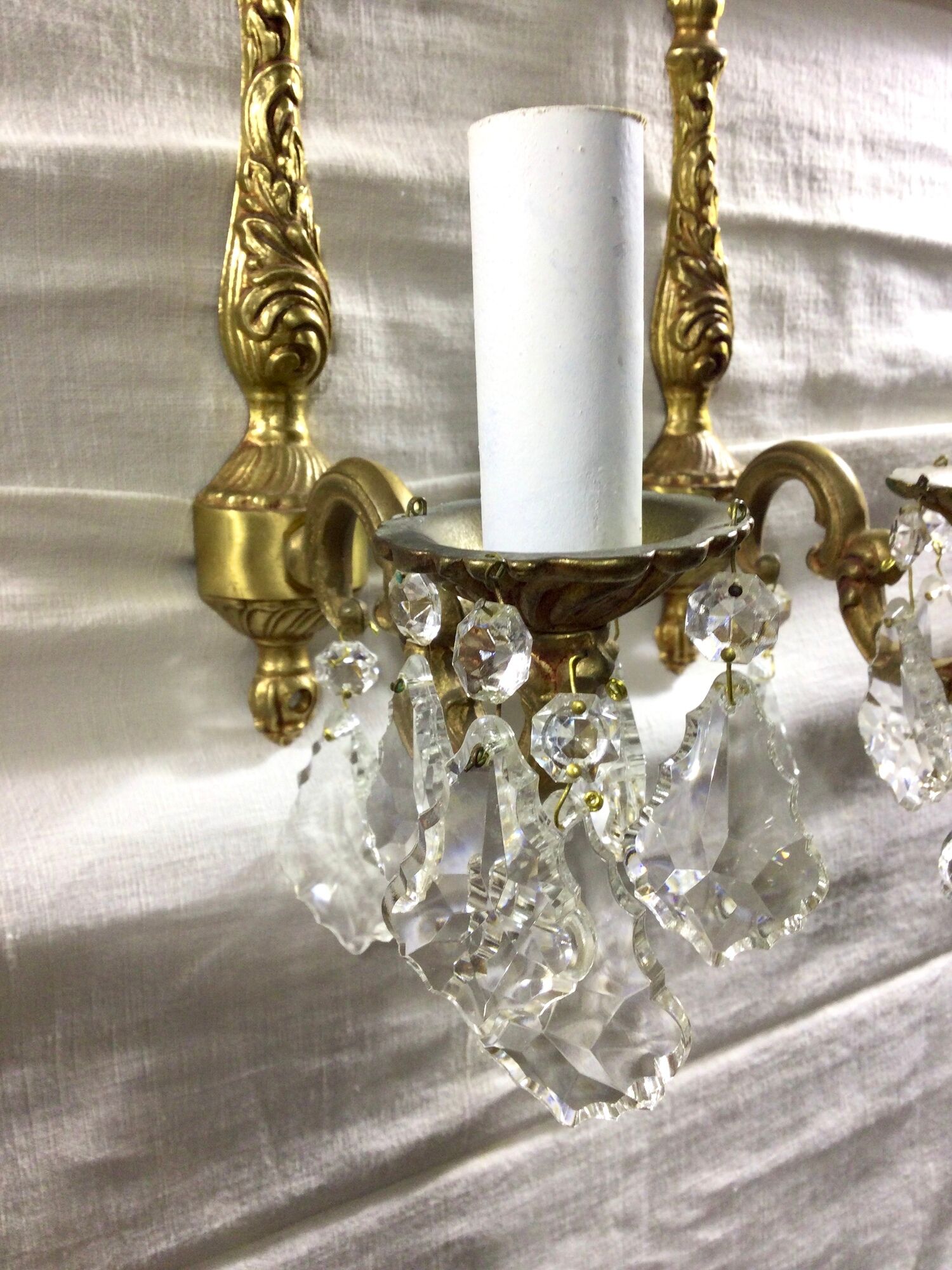 Pair of 1-light bronze sconces and Louis XV style stamps