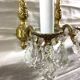 Pair of 1-light bronze sconces and Louis XV style stamps