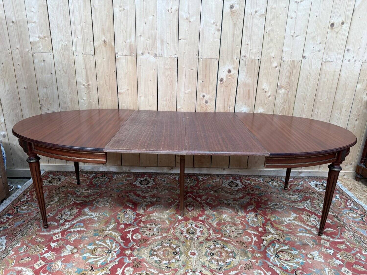 Oval dining table in Louis XVI style