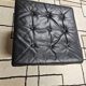 Black leather ottoman 1970 vintage