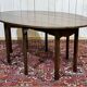 Drop-leaf English table in mahogany called Gateleg.