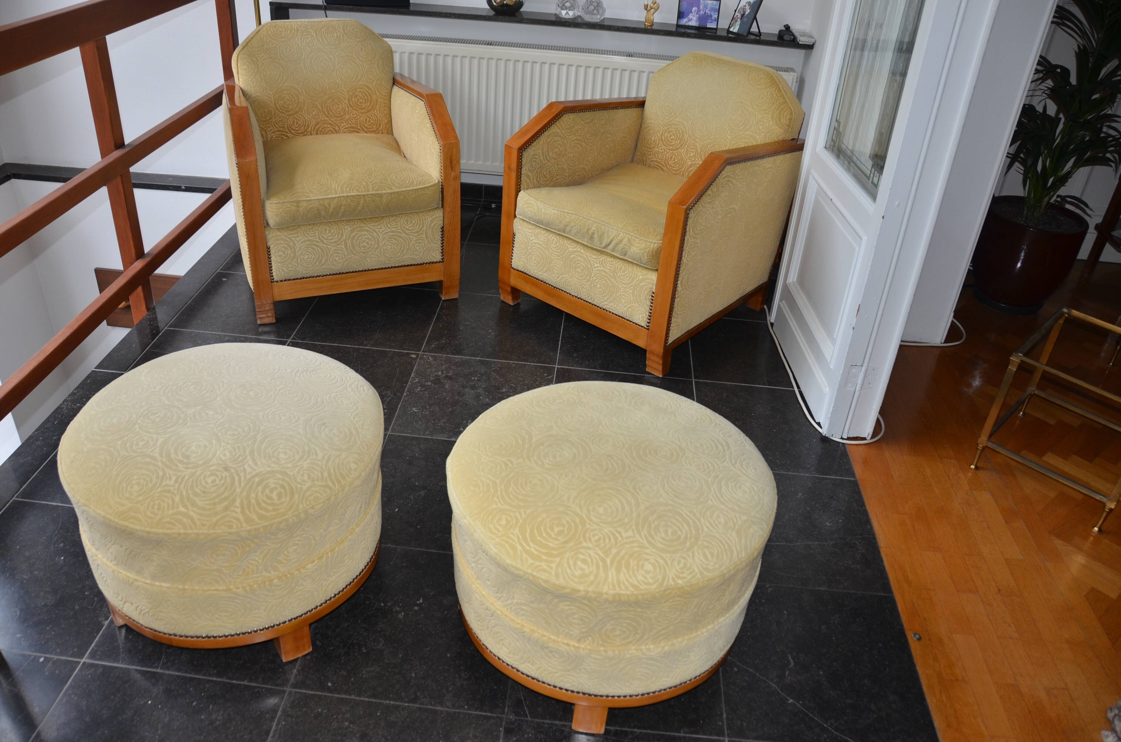 Pair of Art Deco armchairs and poufs