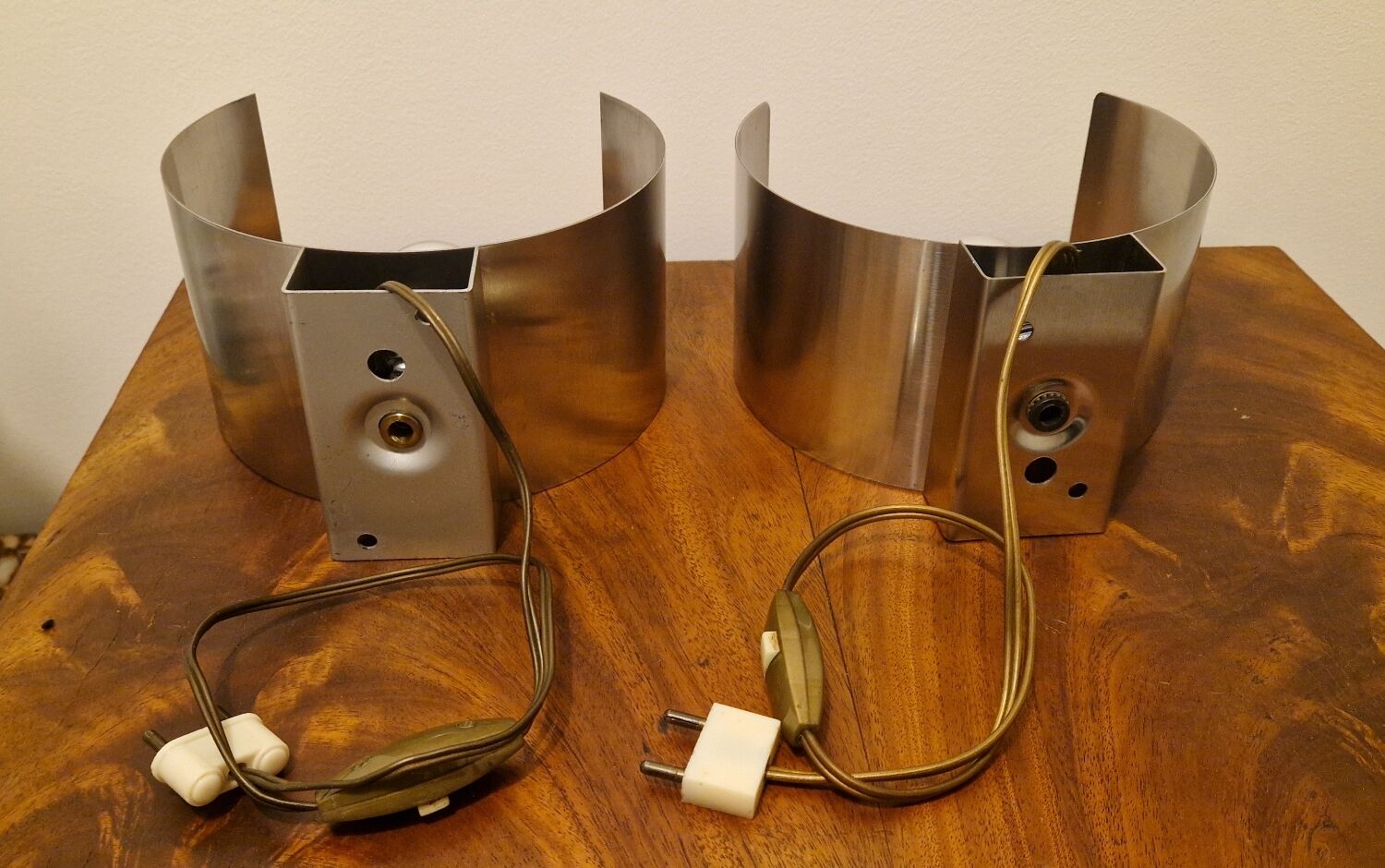 Pair of sculptural lamps in brushed metal – Design by Philippe Rogier