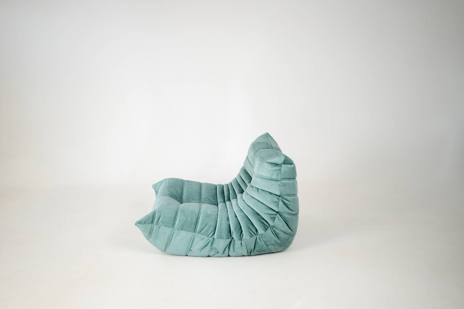 Togo set of armchair and pouf in mint velvet