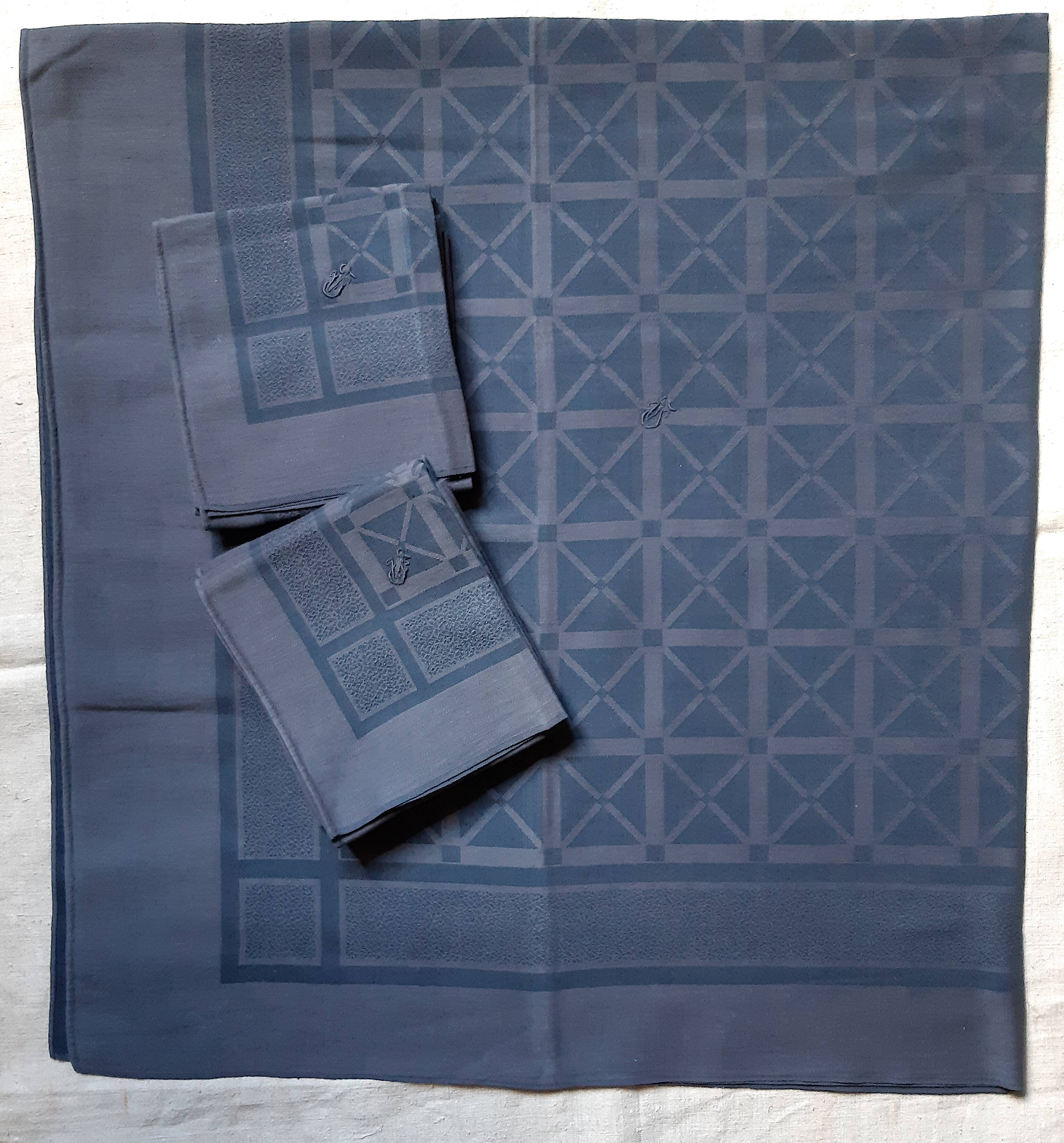 JV monogrammed navy blue checkered table service