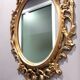 Miroir ovale baroque antique en or 58x84 cm avec cadre orné