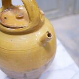 Old gargoulette pot in glazed terracotta