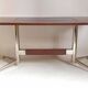 Vintage coffee table from the 1950s in mahogany and metal, with a tabletop width of 110 cm.
