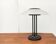 Vintage postmodern table lamp in glass and metal.