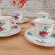 Lot de 6 tasses à café et sous-tasses décor fleuri et liseré doré, porcelaine de Limoges Bernardaud