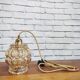 Old vintage hanging lamp stroller in moulded glass