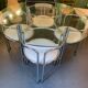 Ensemble table et chaises chrome et verre