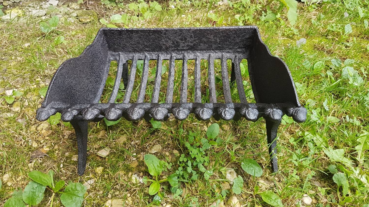 Old vintage black cast iron fireplace