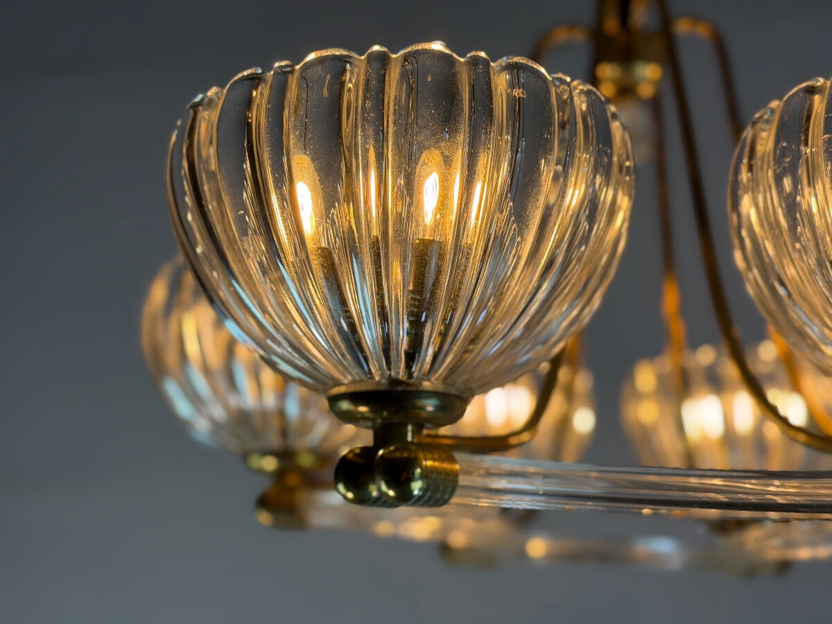 Venetian chandelier in colourless Murano glass and brass, circa 1940.