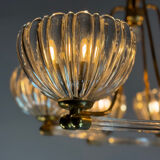 Venetian chandelier in colourless Murano glass and brass, circa 1940.