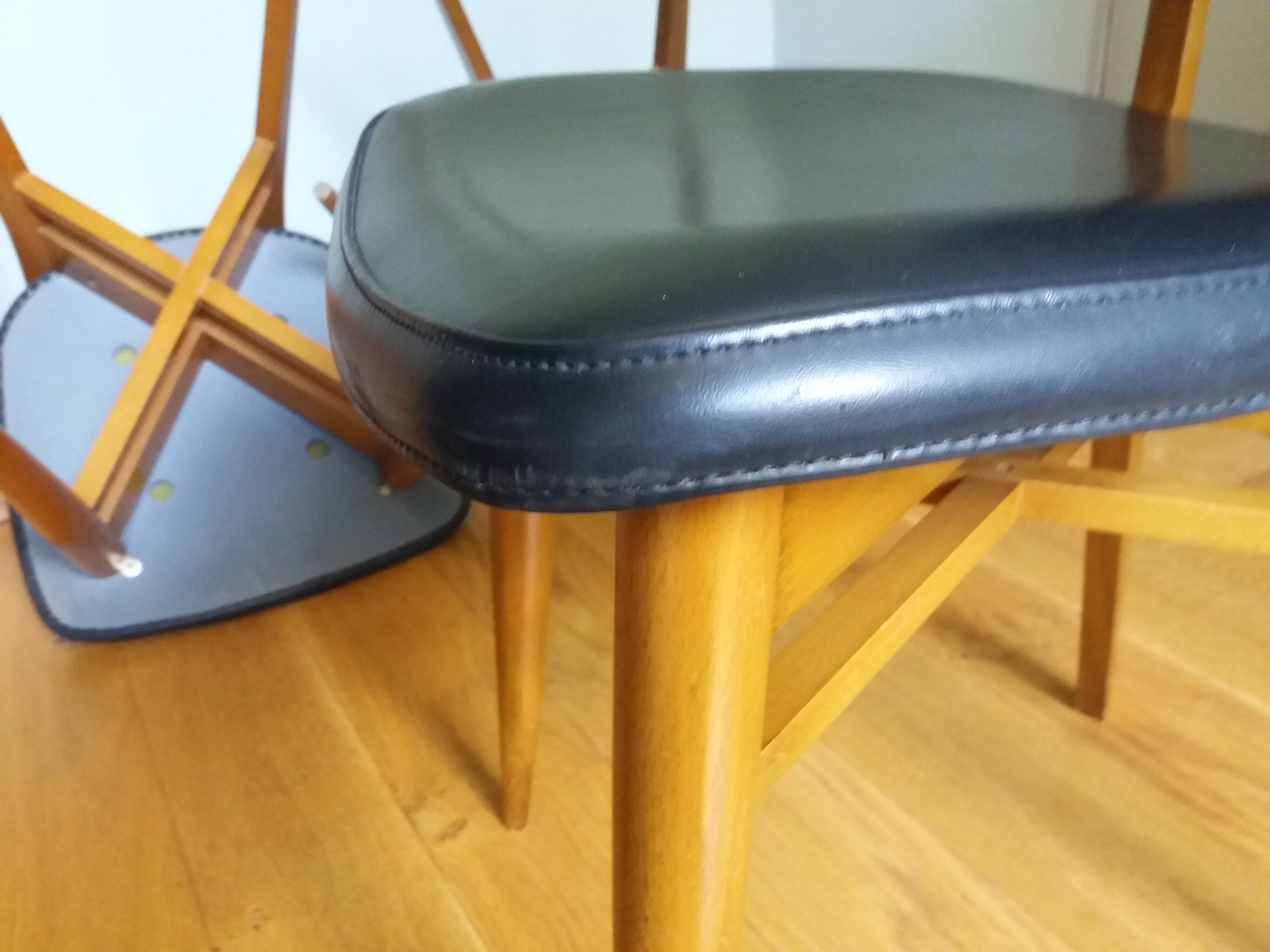 3 Scandinavian style skai faux leather and wood chairs