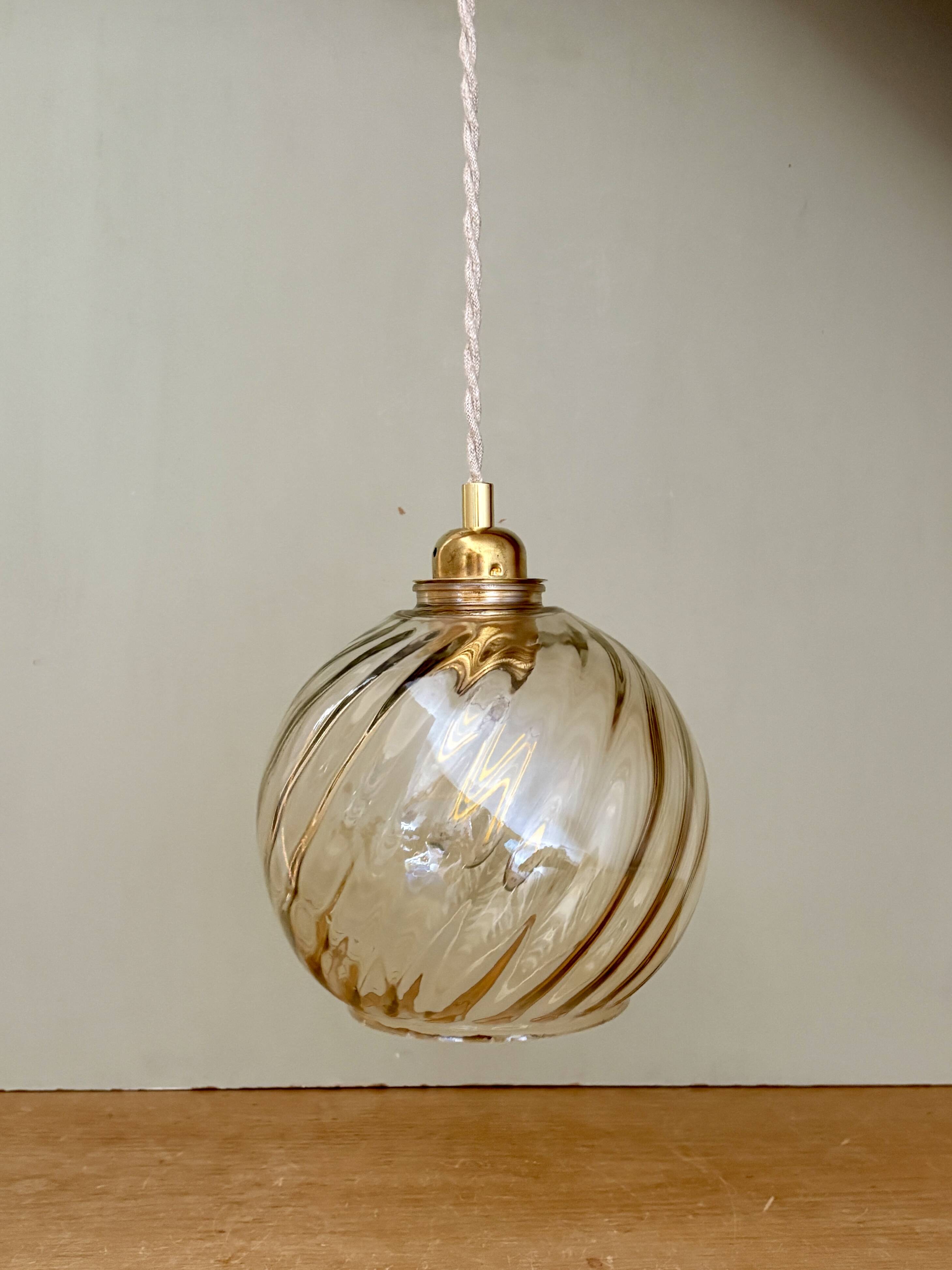 Vintage amber glass globe pendant light
