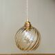 Suspension globe vintage en verre ambré