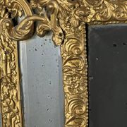 Large antique gilded metal mirror, 19th century
