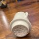 Antique white earthenware teapot, individual service with filter.
