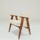 Vintage armchair with rustic wood and beige bouclé design by Chierowsky.