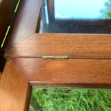 Glass-enclosed old tea table with wooden tray, bronze and brass