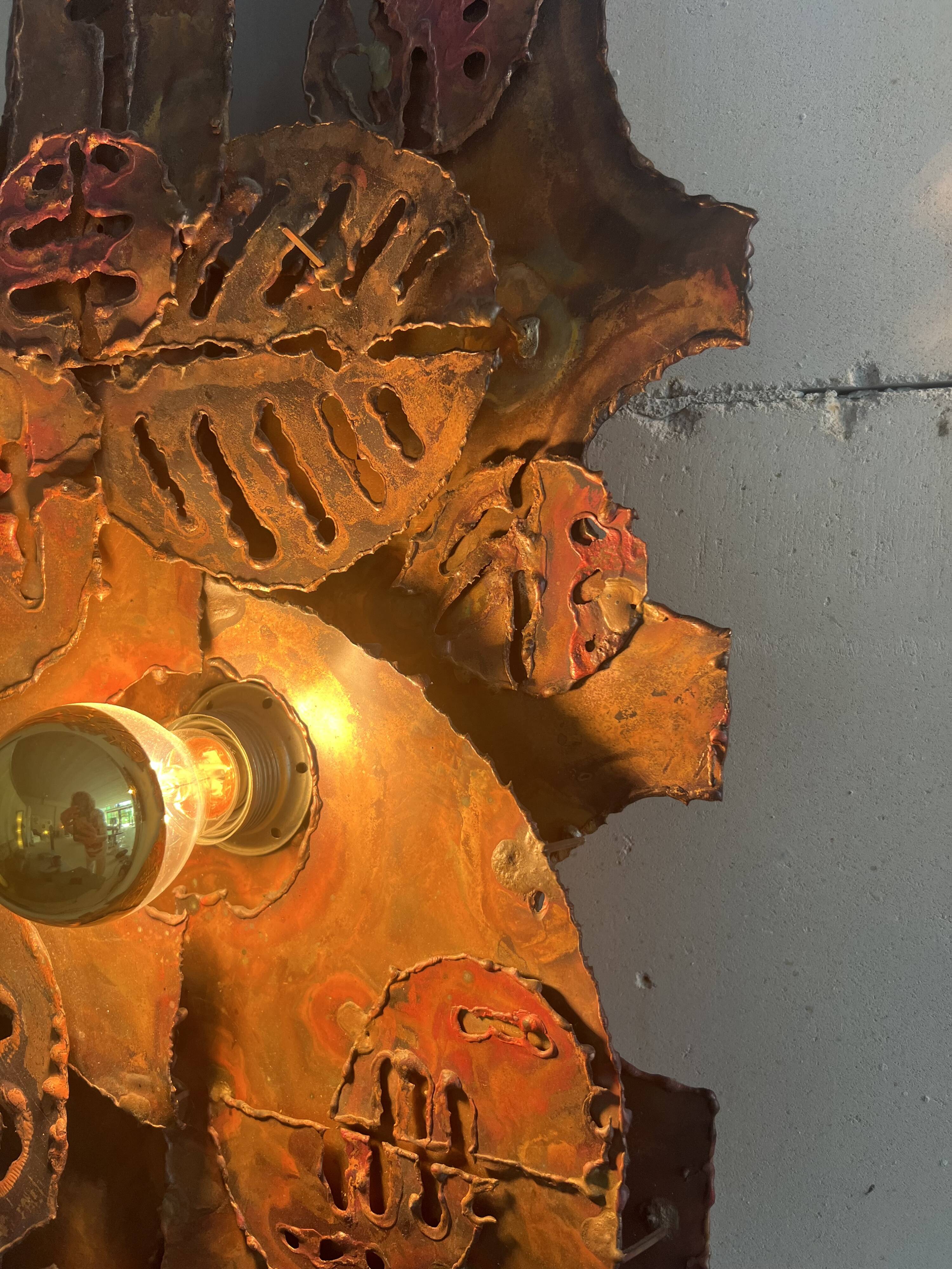 Raw expressive wall sconces by Francesco Pasinato